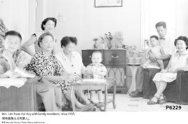Mrs. Lim Foon Hai Hoy with family members; circa 1955.