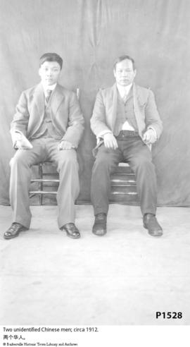 Two unidentified Chinese men; circa 1912.