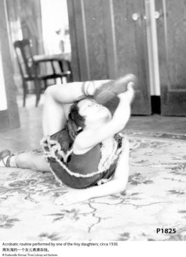 Acrobatic routine performed by one of the Hoy daughters; circa 1930.