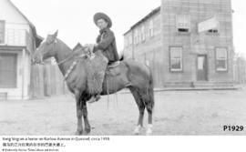 Kong Sing on a horse on Barlow Avenue in Quesnel; circa 1910.