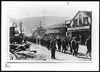 Funeral Procession in Front of Chow Lee Co. in Chinatown, Cumberland B.C.